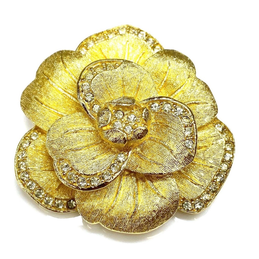 Very detailed flower Christian Dior pin.